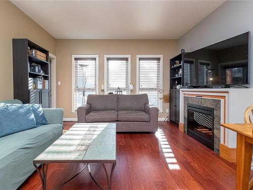 203-201 Nursery Hill Dr, View Royal, BC - Indoor Photo Showing Living Room With Fireplace