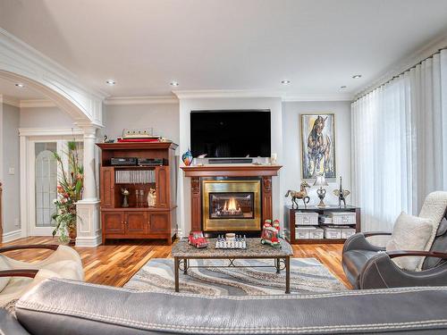 Living room - 715 Rue Des Séminaristes, Saint-Hyacinthe, QC - Indoor Photo Showing Living Room With Fireplace