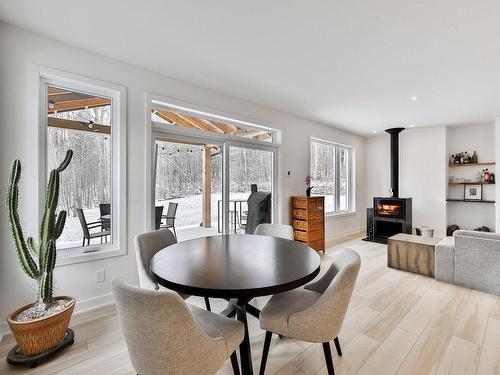 Dining room - 1840 Rue Papillon, Sainte-Julienne, QC - Indoor With Fireplace