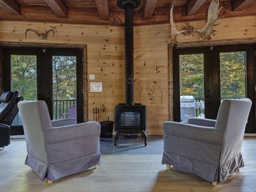 Autre - 132 Rue Du Sommet, Sainte-Béatrix, QC - Indoor Photo Showing Living Room With Fireplace