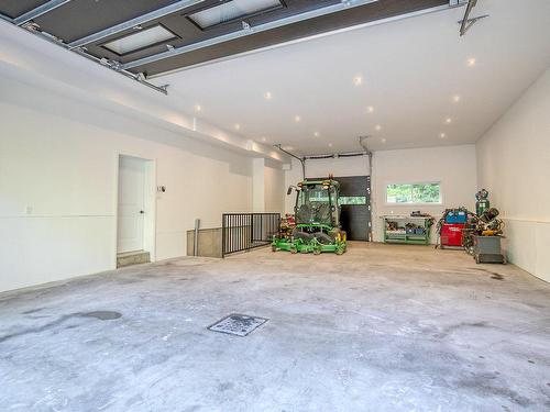 Garage - 108 Rue Bellevue, Bromont, QC - Indoor Photo Showing Garage