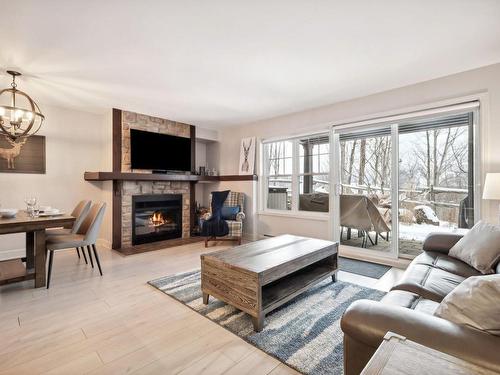 Living room - 3-250 Rue Du Mont-Plaisant, Mont-Tremblant, QC - Indoor Photo Showing Living Room With Fireplace