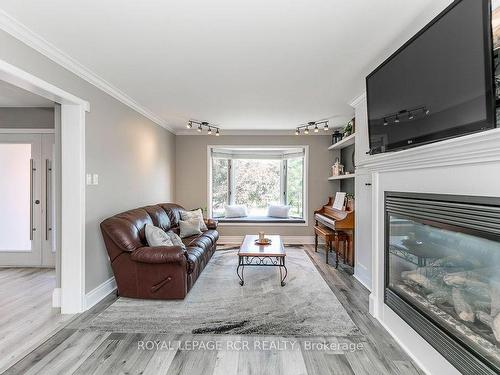 37 Mayfair Dr, Barrie, ON - Indoor Photo Showing Living Room With Fireplace