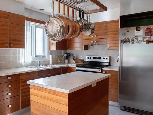 Kitchen - 515 Rue Hocquart, Laval (Duvernay), QC - Indoor Photo Showing Kitchen With Double Sink