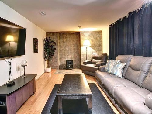 Family room - 133 Rue St-Jean, Mont-Tremblant, QC - Indoor Photo Showing Living Room With Fireplace