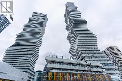 325 - 3900 Confederation Parkway, Mississauga, ON - Outdoor With Balcony With Facade