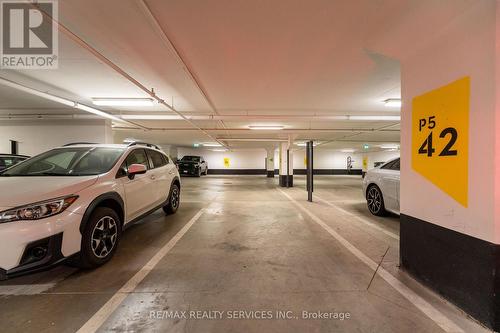 325 - 3900 Confederation Parkway, Mississauga, ON - Indoor Photo Showing Garage