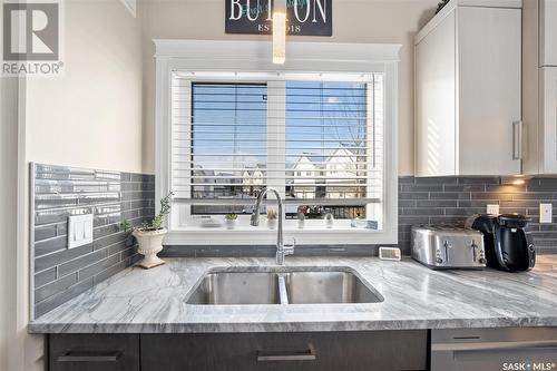 610 Kloppenburg Terrace, Saskatoon, SK - Indoor Photo Showing Kitchen With Double Sink