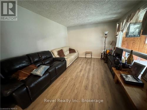 Dining space with ceiling fan, light hardwood / wood-style floors, and a textured ceiling - 3877 Highway 17 E, Mattawa, ON - Indoor Photo Showing Dining Room