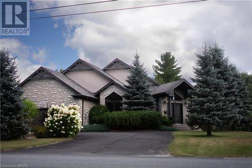 View of front of property with a front yard - 748 Coursol Road, Sturgeon Falls, ON - Outdoor