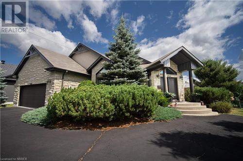 View of front of property with a garage - 748 Coursol Road, Sturgeon Falls, ON - Outdoor