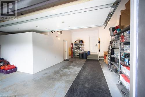 Garage with a garage door opener - 748 Coursol Road, Sturgeon Falls, ON - Indoor Photo Showing Garage