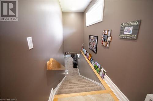 Stairs featuring tile patterned flooring - 748 Coursol Road, Sturgeon Falls, ON - Indoor Photo Showing Other Room