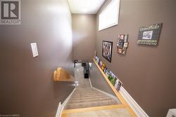 Stairs featuring tile patterned flooring - 