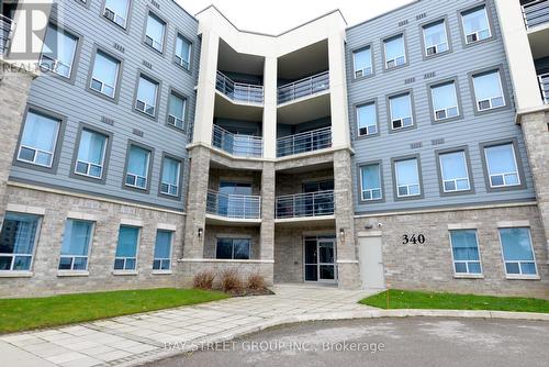 414 - 340 Sugarcreek Trail, London, ON - Outdoor With Balcony With Facade