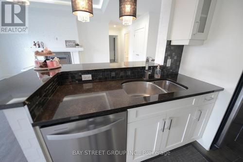 414 - 340 Sugarcreek Trail, London, ON - Indoor Photo Showing Kitchen With Double Sink