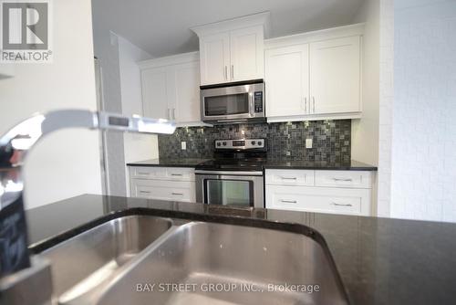 414 - 340 Sugarcreek Trail, London, ON - Indoor Photo Showing Kitchen With Double Sink With Upgraded Kitchen