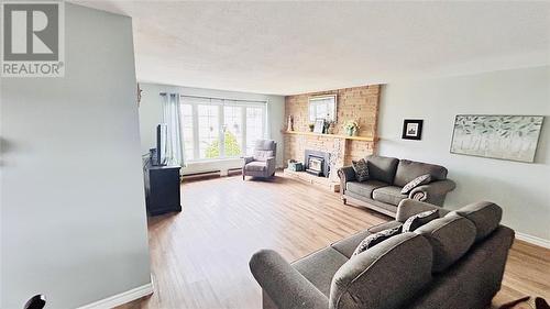 70 Main Street, Springdale, NL - Indoor Photo Showing Living Room With Fireplace