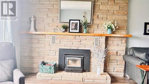 70 Main Street, Springdale, NL - Indoor Photo Showing Living Room With Fireplace