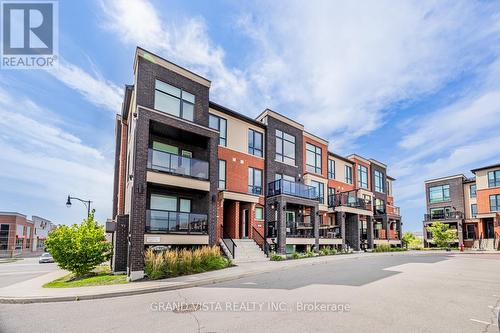 07 - 100 Dufay Road, Brampton, ON - Outdoor With Facade