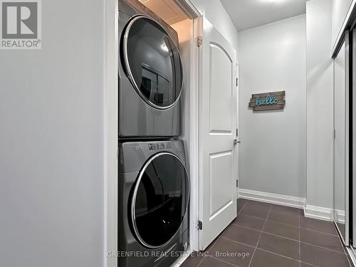 314 - 55 De Boers Drive, Toronto, ON - Indoor Photo Showing Laundry Room