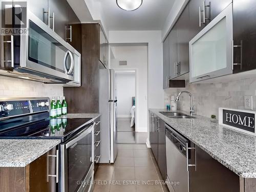 314 - 55 De Boers Drive, Toronto, ON - Indoor Photo Showing Kitchen With Stainless Steel Kitchen With Double Sink With Upgraded Kitchen