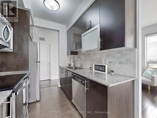 314 - 55 De Boers Drive, Toronto, ON - Indoor Photo Showing Kitchen With Stainless Steel Kitchen With Upgraded Kitchen