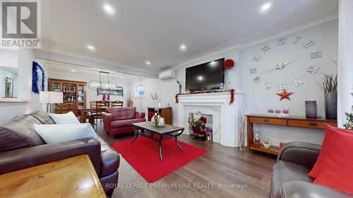 67 Montcalm Avenue, Toronto, ON - Indoor Photo Showing Living Room With Fireplace