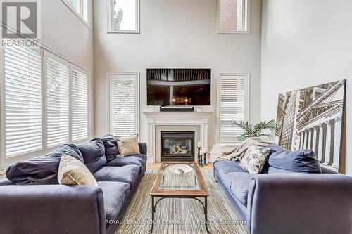 9 Port Rush Trail, Markham, ON - Indoor Photo Showing Living Room With Fireplace