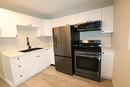 230 Paul Avenue, The Pas, MB  - Indoor Photo Showing Kitchen With Double Sink 