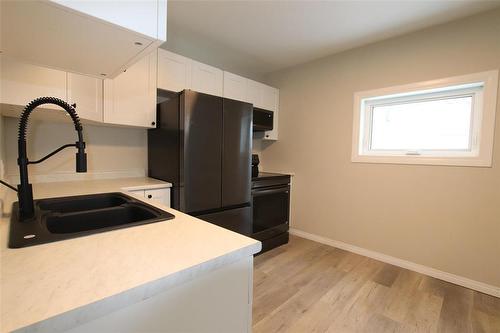 230 Paul Avenue, The Pas, MB - Indoor Photo Showing Kitchen With Double Sink