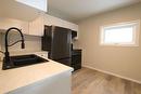 230 Paul Avenue, The Pas, MB  - Indoor Photo Showing Kitchen With Double Sink 