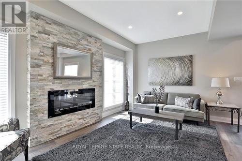 1 Garlent Avenue W, Hamilton, ON - Indoor Photo Showing Living Room With Fireplace