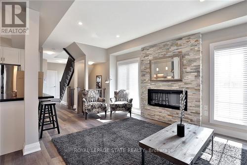 1 Garlent Avenue W, Hamilton, ON - Indoor Photo Showing Living Room With Fireplace