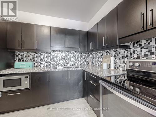 407 - 5 Vicora Linkway, Toronto, ON - Indoor Photo Showing Kitchen With Upgraded Kitchen