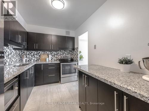 407 - 5 Vicora Linkway, Toronto, ON - Indoor Photo Showing Kitchen With Upgraded Kitchen