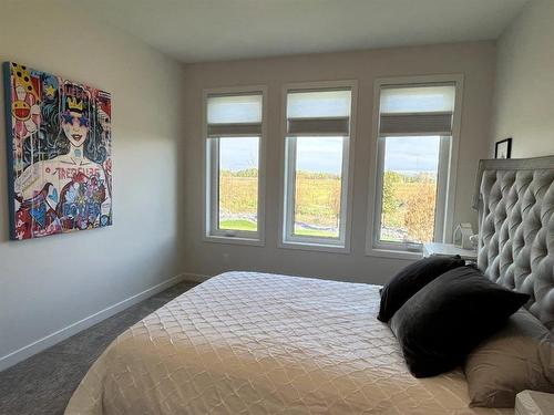 32 Ash Cove, Headingley, MB - Indoor Photo Showing Bedroom