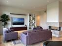 32 Ash Cove, Headingley, MB  - Indoor Photo Showing Living Room With Fireplace 