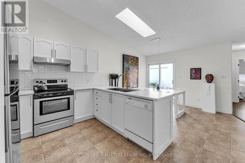 1037 Rainbow Crescent, Kingston (Kingston East (Incl Barret Crt)), ON - Indoor Photo Showing Kitchen With Double Sink