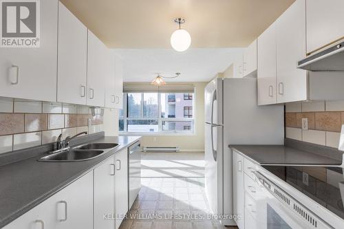 309 - 95 Base Line Road W, London, ON - Indoor Photo Showing Kitchen With Double Sink