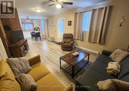 111 Second Avenue, Englehart, ON - Indoor Photo Showing Living Room With Fireplace