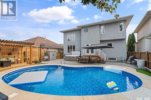 722 Brookhurst Lane, Saskatoon, SK - Outdoor With In Ground Pool With Deck Patio Veranda With Backyard With Exterior