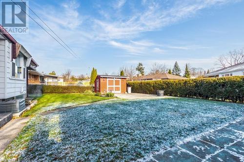 View of yard with a storage unit - 133 Fairview Crescent, Woodstock, ON - Outdoor