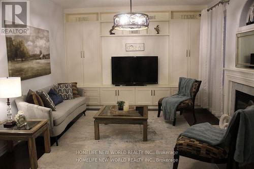 4617 Simmons Road E, Burlington, ON - Indoor Photo Showing Living Room With Fireplace