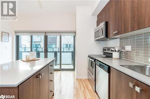 Eat-in kitchen with walkout to the patio - 369 Essa Road Unit# 22, Barrie, ON - Indoor Photo Showing Kitchen