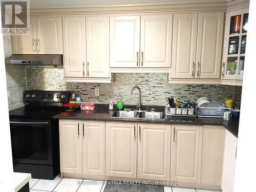 209 - 120 Dundalk Drive, Toronto, ON - Indoor Photo Showing Kitchen With Double Sink