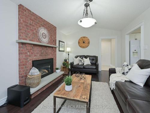 33 Riverside Dr, Mono, ON - Indoor Photo Showing Living Room With Fireplace