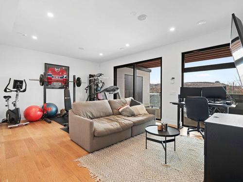 Family room - 138 Ch. De Touraine, Saint-Sauveur, QC - Indoor Photo Showing Gym Room