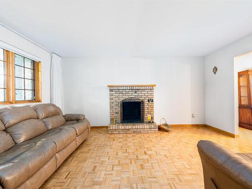 Salon - 3540 Rue Tétrault, Montréal (Saint-Laurent), QC - Indoor Photo Showing Living Room With Fireplace