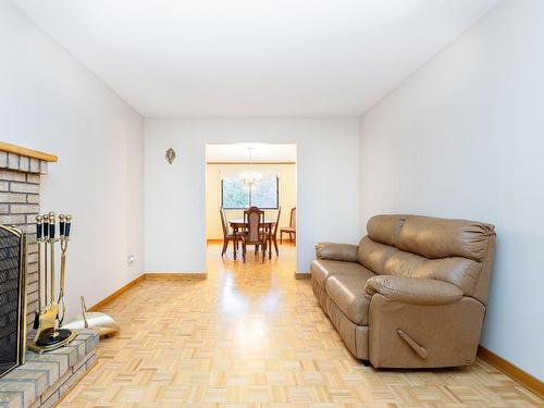 Salon - 3540 Rue Tétrault, Montréal (Saint-Laurent), QC - Indoor Photo Showing Living Room With Fireplace